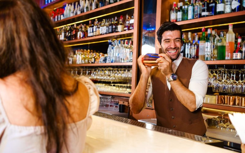 Caucasian,Professional,Bartender,Or,Mixologist,Making,A,Cocktail,For,Women Caucasian,Professional,Bartender,Or,Mixologist,Making,A,Cocktail,For,Women